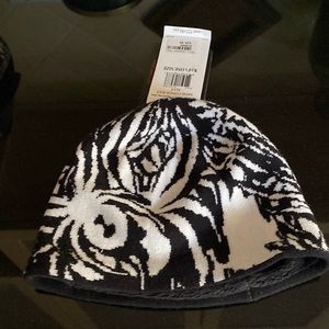 Mini conquest ski/winter hat.
Brand Spyder active sports
Kids one size